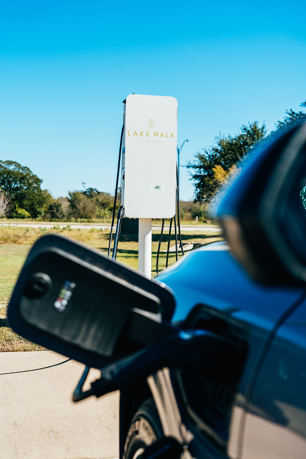 Sustainable Development at Lake Walk: Embracing Green Spaces and Electric Car Charging Stations