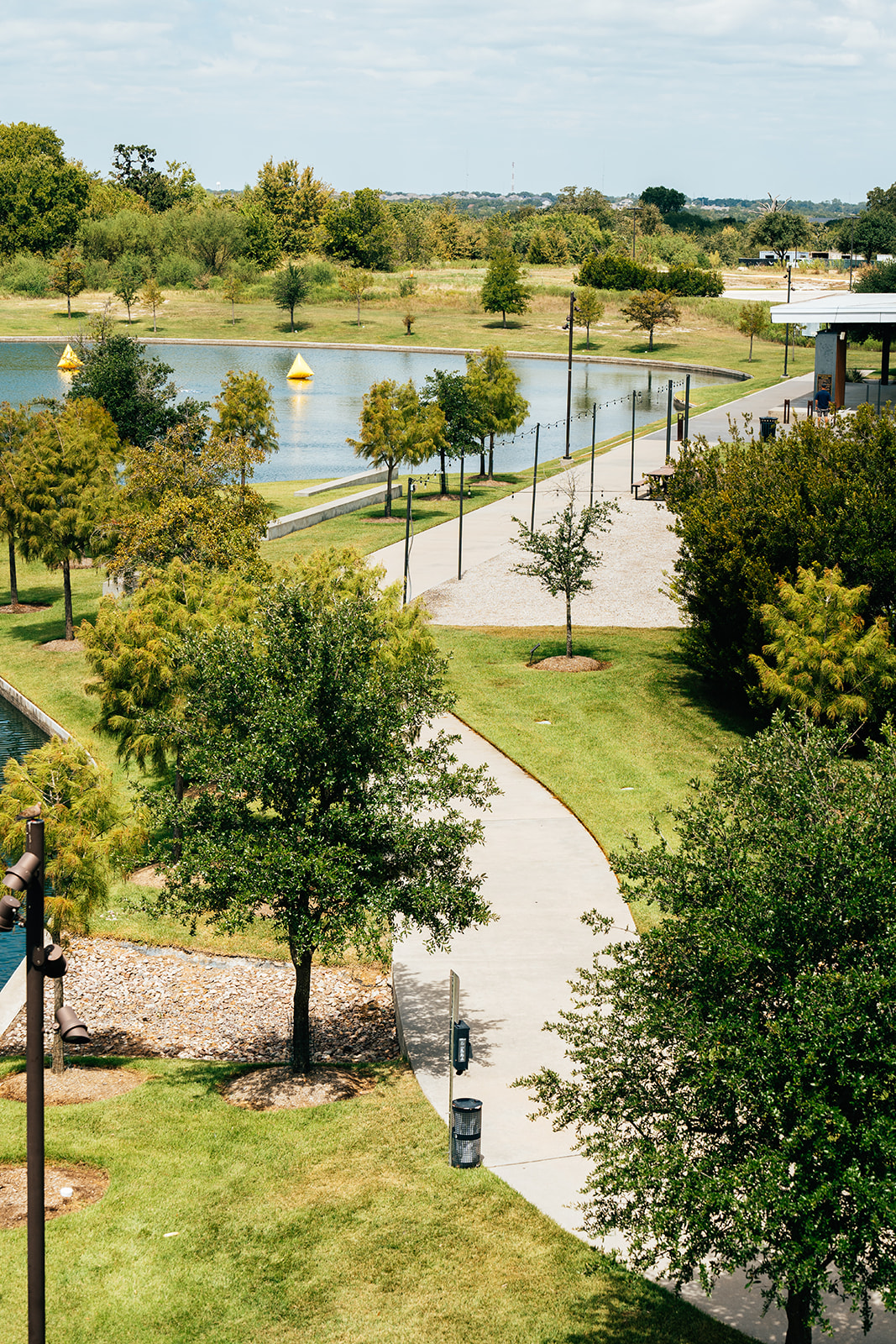 Sustainable Development at Lake Walk: Embracing Green Spaces and Electric Car Charging Stations
