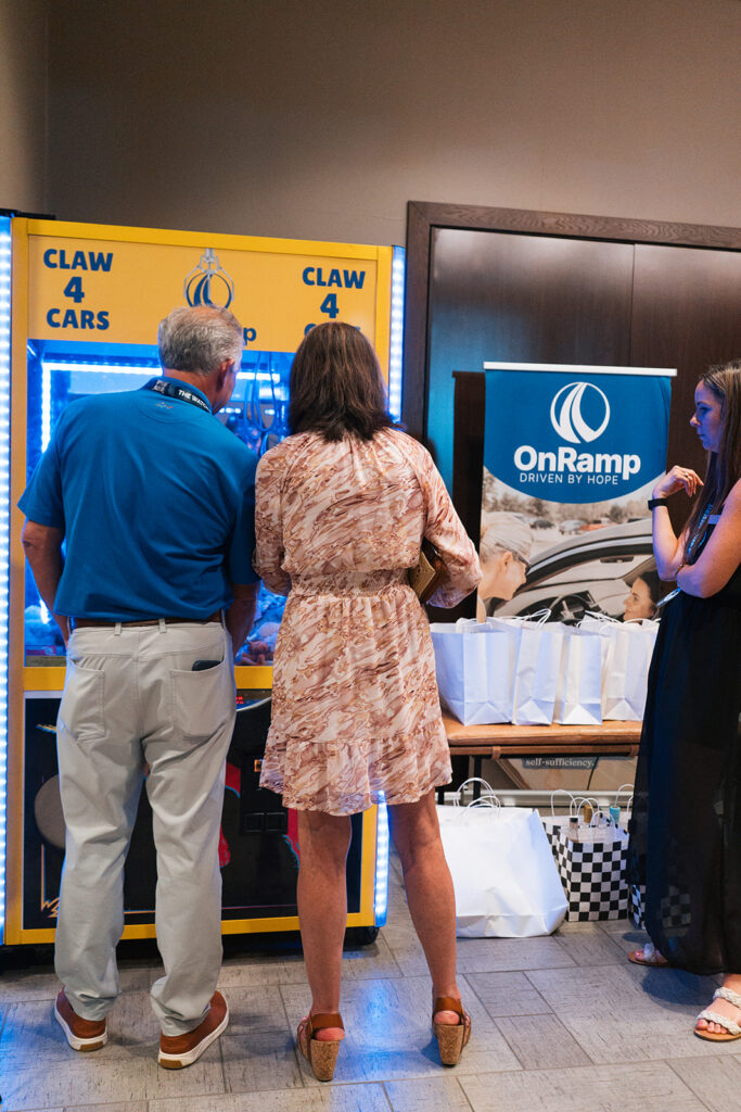 Wheels | Watches | Whiskey returned to Lake Walk with more than 550 guests, an exceptional collection of cars, watches, and whiskey, and a record-setting $15,000+ raised for OnRamp.